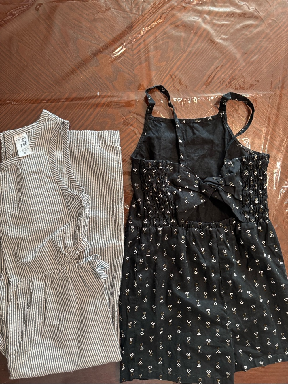 Lot of 2 Carter's Black Floral Smocked Romper and gray striped jumpsuit